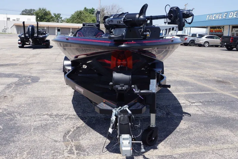 Slide: The Image of Front view of a 2027 Phoenix 921 Elite X boat on a trailer in a parking lot. - 15