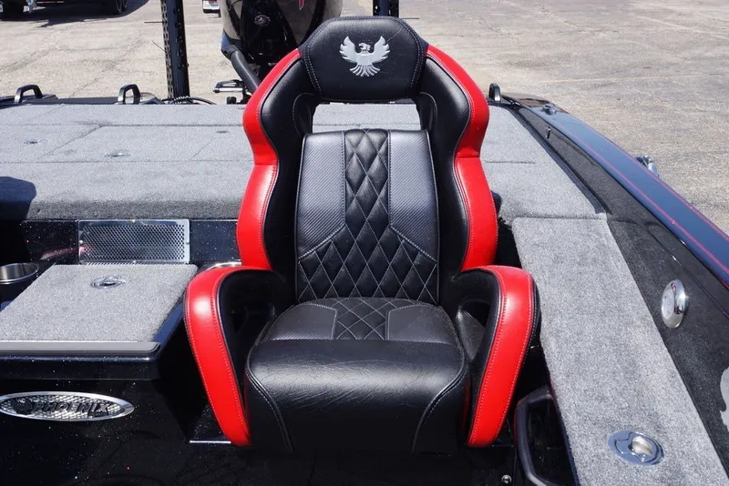 Slide: The Image of Luxurious black and red seat in 2027 Phoenix 921 Elite X boat. - 18