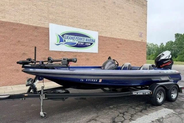 The Image of 2014 Skeeter TZX195 boat on trailer at Grand Pointe Marina. - 1
