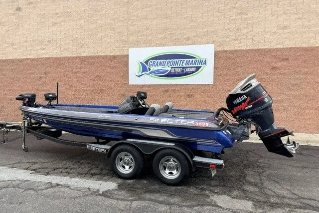 Slide: The Image of 2014 Skeeter TZX195 boat with Yamaha motor at Grand Pointe Marina. - 2