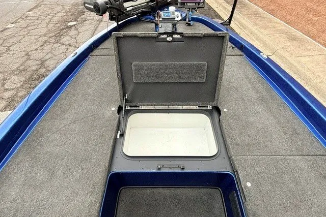 Slide: The Image of 2014 Skeeter TZX195 boat with open storage compartment on deck. - 15