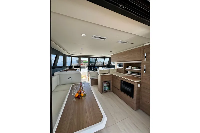 Slide: The Image of Luxurious interior of 2026 Aventura 38 Motor Yacht with modern kitchen and seating area. - 23