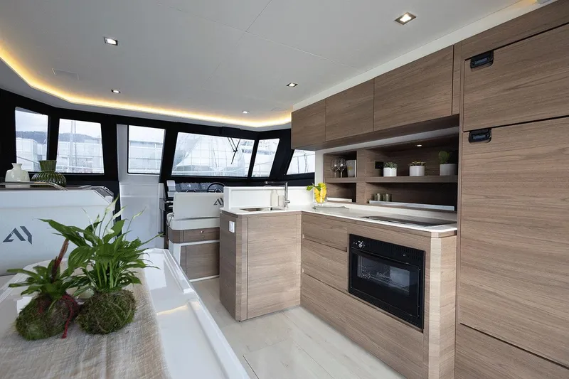 Slide: The Image of Luxurious interior of 2026 Aventura 38 Motor Yacht with modern kitchen design. - 14