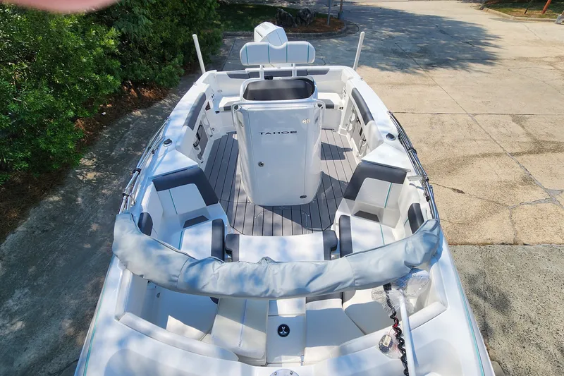 Slide: The Image of 2026 Tahoe 2150 CC boat with spacious seating and modern design. - 6