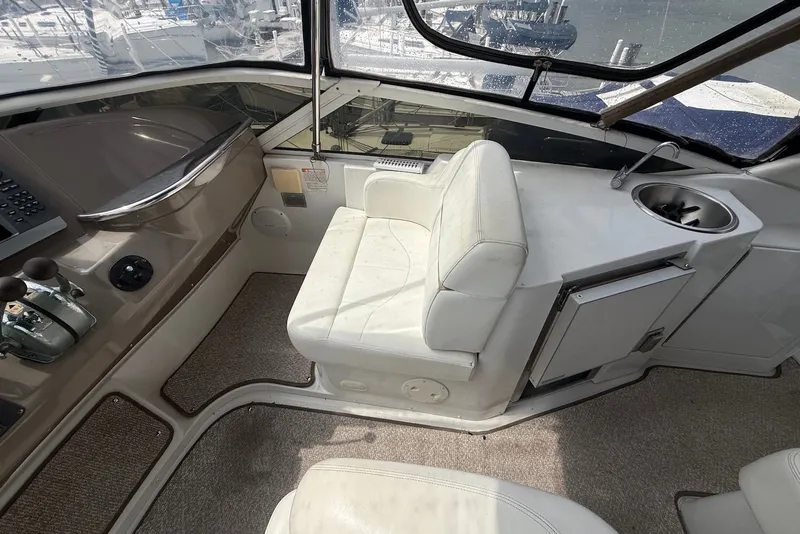 Slide: The Image of Captain's seat and controls on 2000 Carver 396 Motor Yacht bridge. - 14