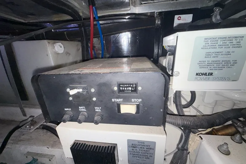 Slide: The Image of Engine compartment of a 2000 Carver 396 Motor Yacht with Kohler power systems. - 34