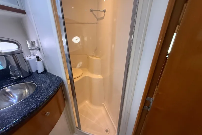 Slide: The Image of Bathroom interior of 2000 Carver 396 Motor Yacht with shower and sink. - 31