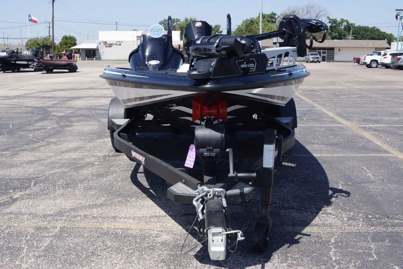 Slide: The Image of 2027 Phoenix 720 ZXL boat on trailer in parking lot. - 7