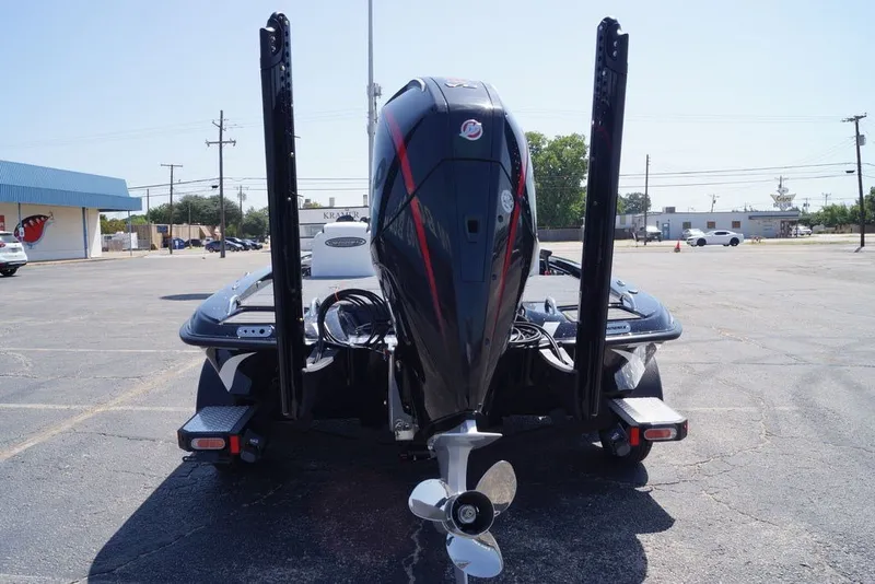 Slide: The Image of Rear view of a 2027 Phoenix 720 ZXL boat with powerful outboard motor. - 6