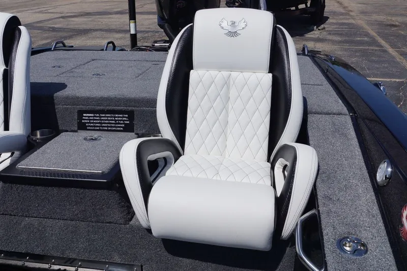 Slide: The Image of Luxurious white seat in 2027 Phoenix 720 ZXL boat, featuring diamond stitching and sleek design. - 15