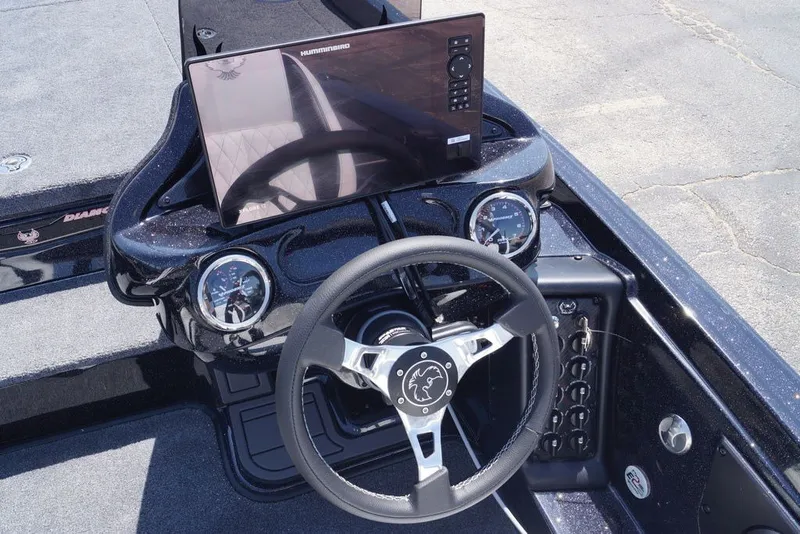 Slide: The Image of Dashboard of a 2027 Phoenix 720 ZXL boat with steering wheel and display. - 14
