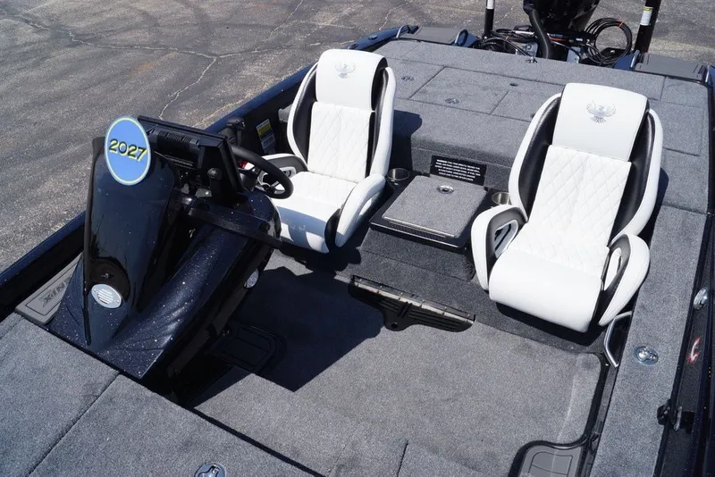 Slide: The Image of Interior of 2027 Phoenix 720 ZXL boat with white seats and modern dashboard. - 11