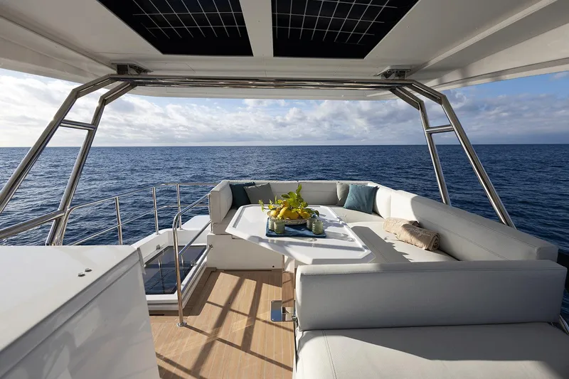 Slide: The Image of Luxurious 2026 Aventura 38 Motor Yacht with elegant seating and ocean view. - 3