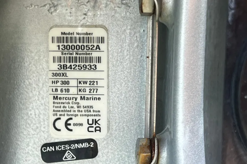Slide: The Image of Label on Mercury Marine engine, model 300XL, with specifications and compliance markings. - 191