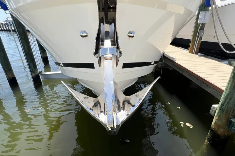 Slide: The Image of 2024 Skamander 100 Sorrento yacht with a polished anchor at dockside. - 38