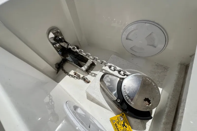 Slide: The Image of Anchor chain mechanism on 2024 Skamander 100 Sorrento boat deck. - 94