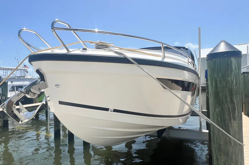 Slide: The Image of 2024 Skamander 100 Sorrento boat docked, showcasing sleek design and modern features. - 47