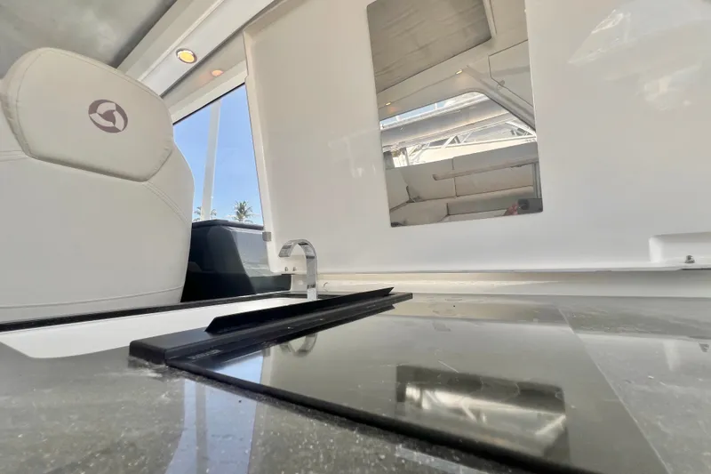 Slide: The Image of Interior of 2024 Skamander 100 Sorrento boat, featuring sleek design and modern seating. - 153