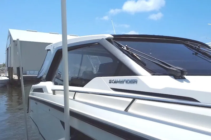 Slide: The Image of 2024 Skamander 100 Sorrento boat docked, showcasing sleek design and modern features. - 30
