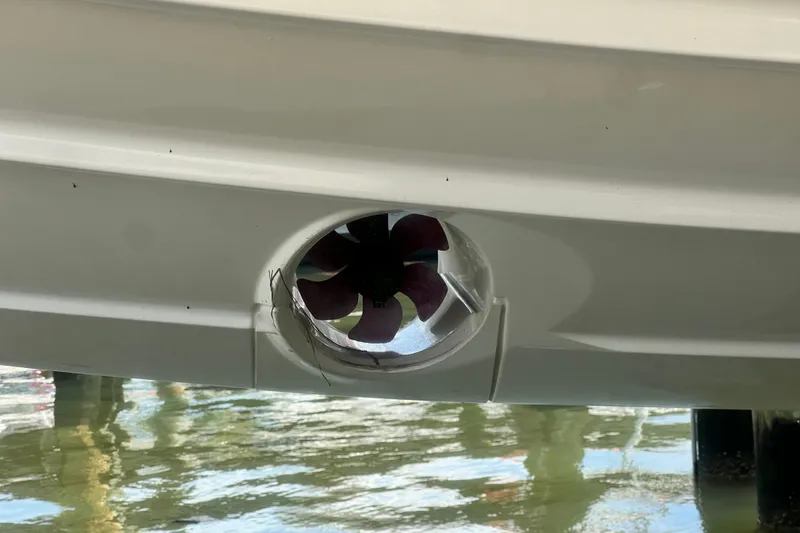 Slide: The Image of 2024 Skamander 100 Sorrento boat thruster detail above water. - 52