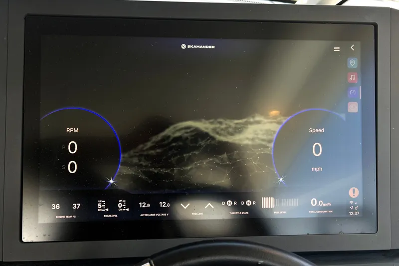 Slide: The Image of 2024 Skamander 100 Sorrento dashboard display showing RPM, speed, and various controls. - 113