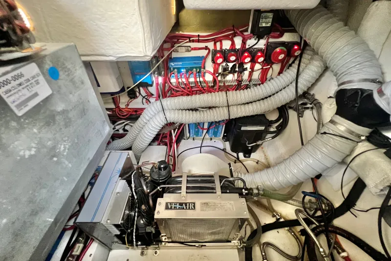 Slide: The Image of Engine room of 2024 Skamander 100 Sorrento with wiring and ventilation systems. - 155
