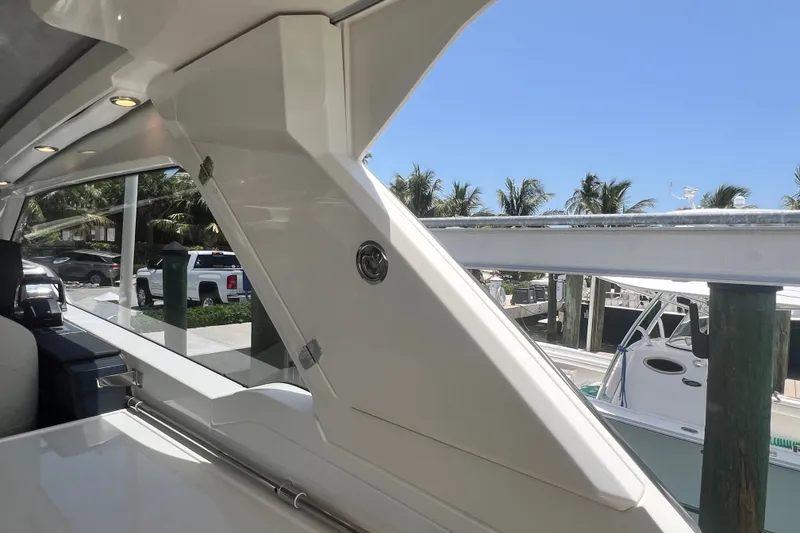 Slide: The Image of 2024 Skamander 100 Sorrento yacht interior with sleek design and marina view. - 174