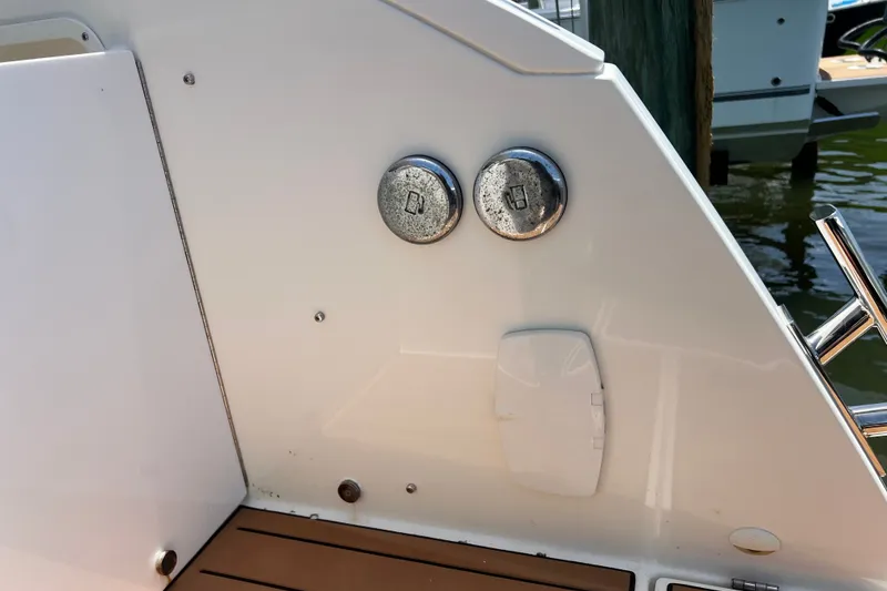 Slide: The Image of 2024 Skamander 100 Sorrento boat deck with fuel and water caps. - 78