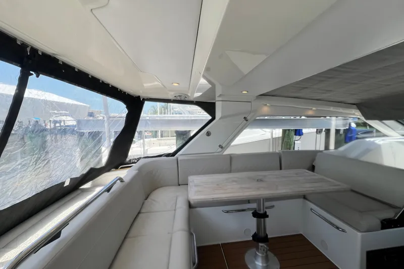 Slide: The Image of Luxurious interior of 2024 Skamander 100 Sorrento yacht with elegant seating and table. - 177