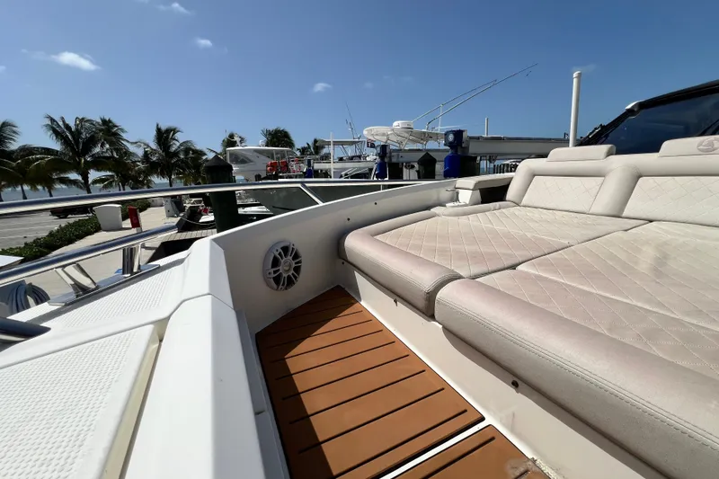 Slide: The Image of 2024 Skamander 100 Sorrento yacht deck with luxurious seating and ocean view. - 96