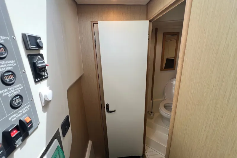 Slide: The Image of 2024 Skamander 100 Sorrento yacht bathroom with control panel and modern amenities. - 135