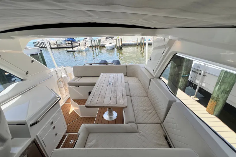 Slide: The Image of Luxurious interior of 2024 Skamander 100 Sorrento yacht with elegant seating and wooden table. - 164