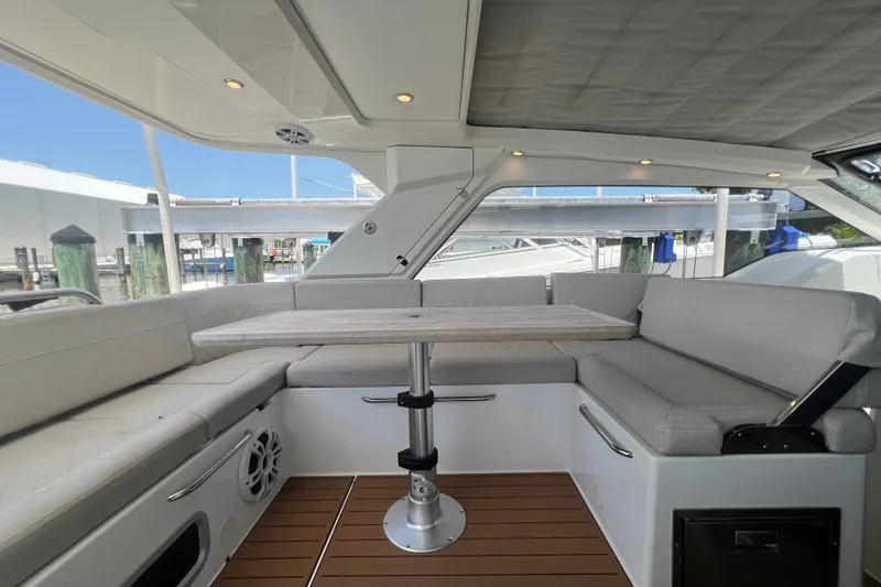 Slide: The Image of Luxurious interior of 2024 Skamander 100 Sorrento yacht with elegant seating and table. - 172