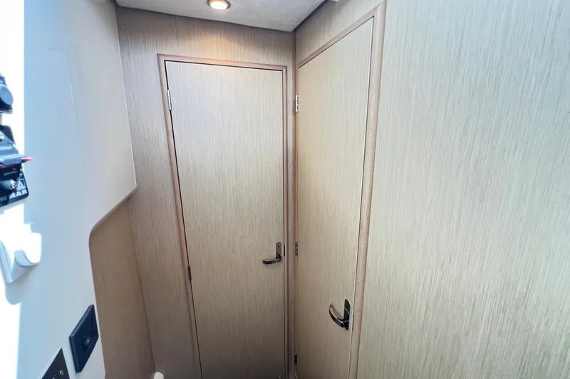 Slide: The Image of 2024 Skamander 100 Sorrento interior with wooden doors and modern lighting. - 134