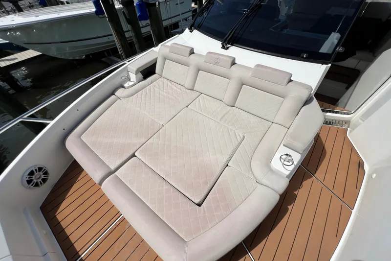 Slide: The Image of Luxurious seating on 2024 Skamander 100 Sorrento yacht, featuring elegant beige upholstery. - 100