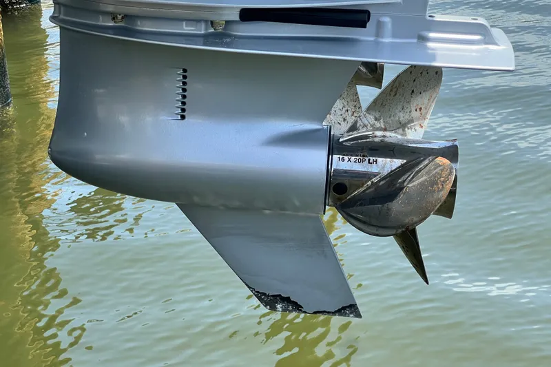 Slide: The Image of 2024 Skamander 100 Sorrento boat propeller in water, showcasing design and condition. - 72