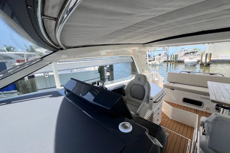 Slide: The Image of 2024 Skamander 100 Sorrento yacht interior with modern seating and sleek design. - 166
