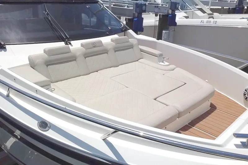 Slide: The Image of 2024 Skamander 100 Sorrento boat with luxurious beige seating and sleek design. - 35