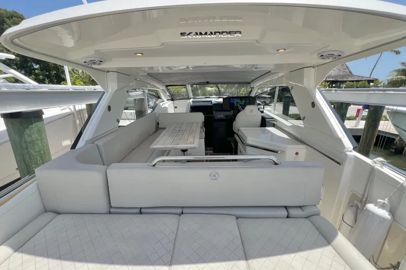 Slide: The Image of 2024 Skamander 100 Sorrento luxury yacht interior with seating and helm. - 67