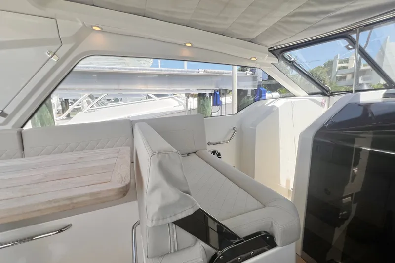Slide: The Image of Interior of 2024 Skamander 100 Sorrento yacht with elegant seating and table. - 118