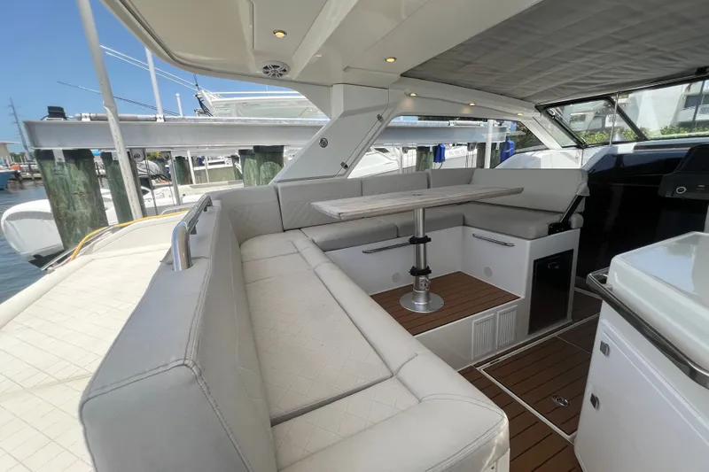 Slide: The Image of Luxurious interior of 2024 Skamander 100 Sorrento yacht with plush seating and elegant table. - 85