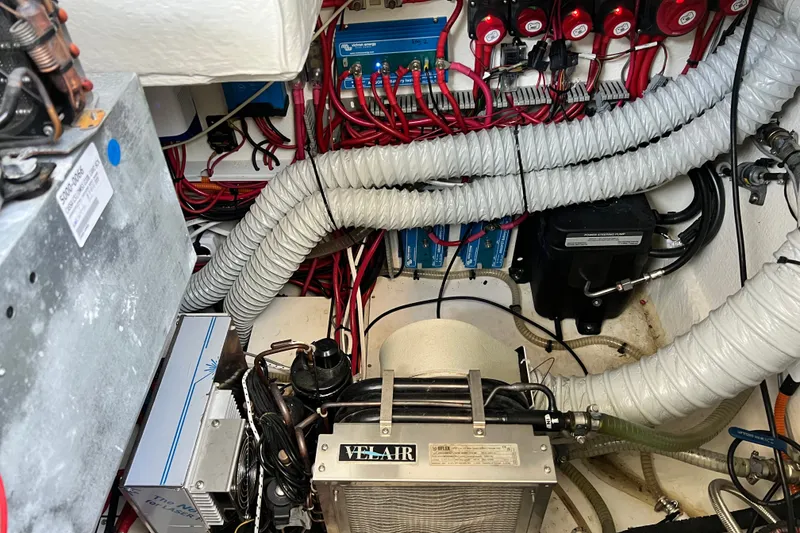 Slide: The Image of Engine room of 2024 Skamander 100 Sorrento with wiring and ventilation systems. - 157