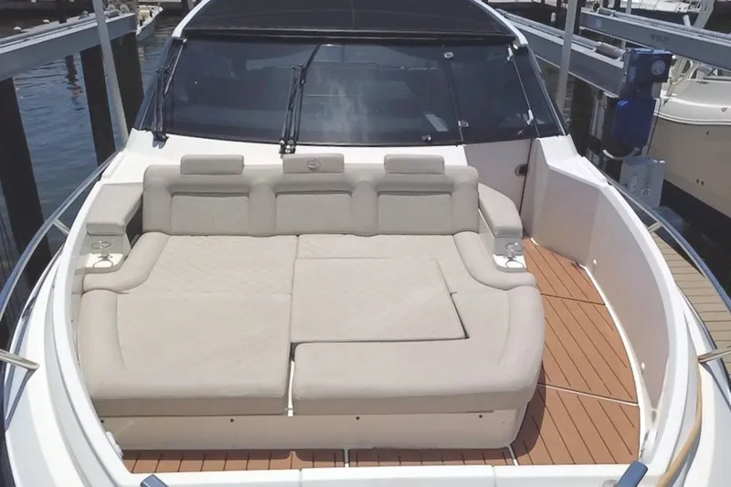 Slide: The Image of 2024 Skamander 100 Sorrento yacht with luxurious beige seating on deck. - 42