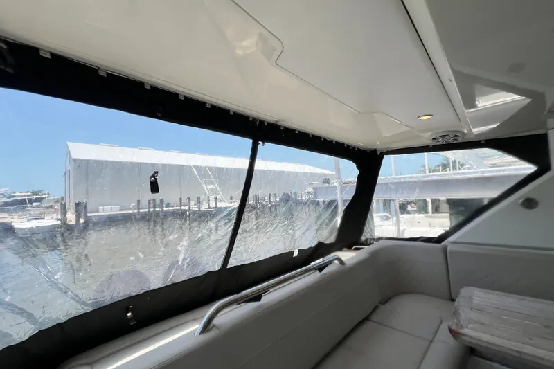 Slide: The Image of 2024 Skamander 100 Sorrento boat interior with dockside view through windows. - 59