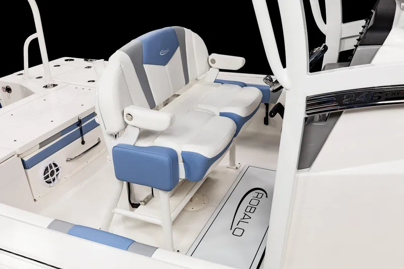 Slide: The Image of Manufacturer Provided Image: 2025 Robalo 246 Cayman boat interior with blue and white seating. - 8