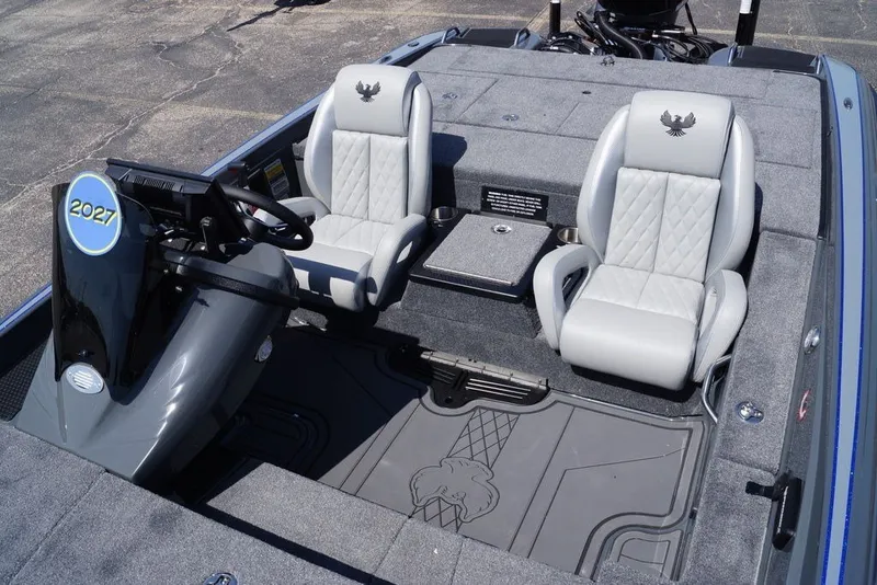 Slide: The Image of Interior of 2027 Phoenix 721 ZXL boat with dual gray seats and steering console. - 17