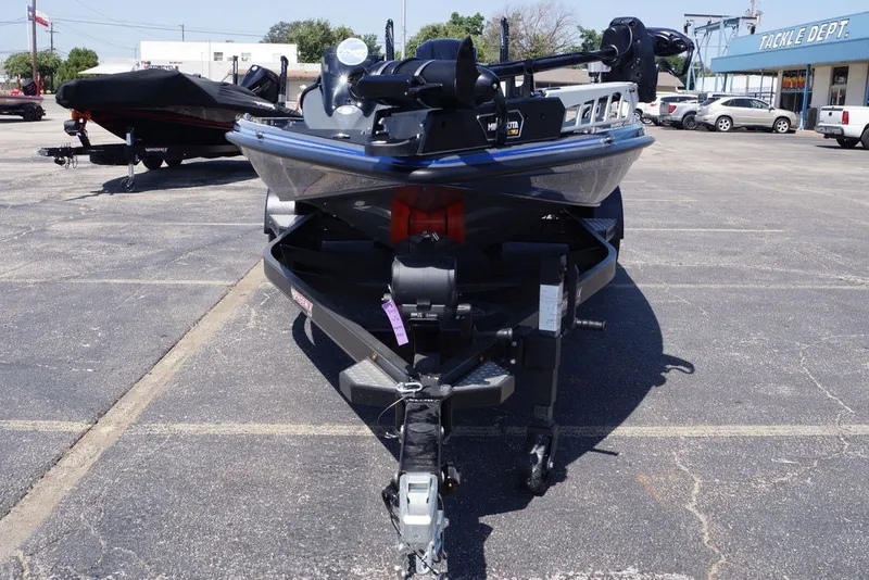 Slide: The Image of 2027 Phoenix 721 ZXL boat on trailer in parking lot near tackle shop. - 4