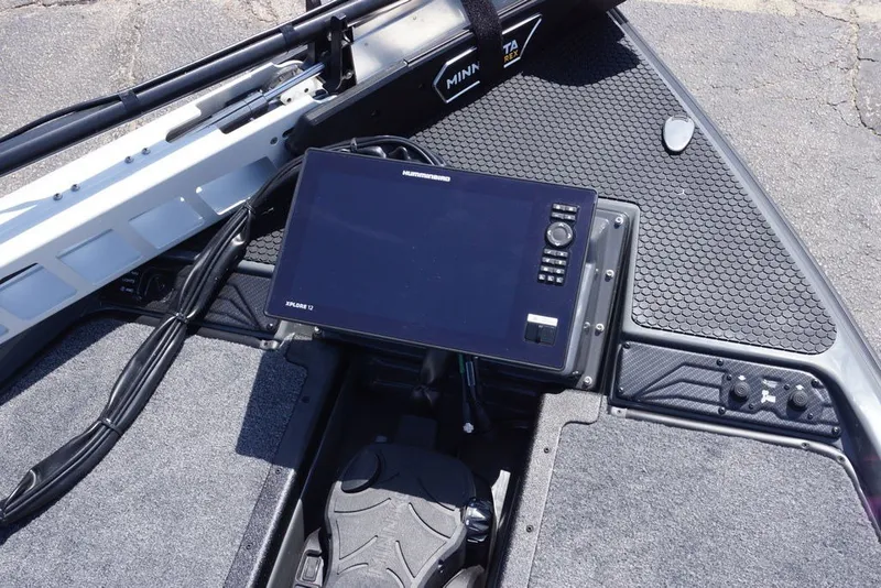 Slide: The Image of Dashboard of a 2027 Phoenix 721 ZXL boat with a Humminbird fish finder. - 9