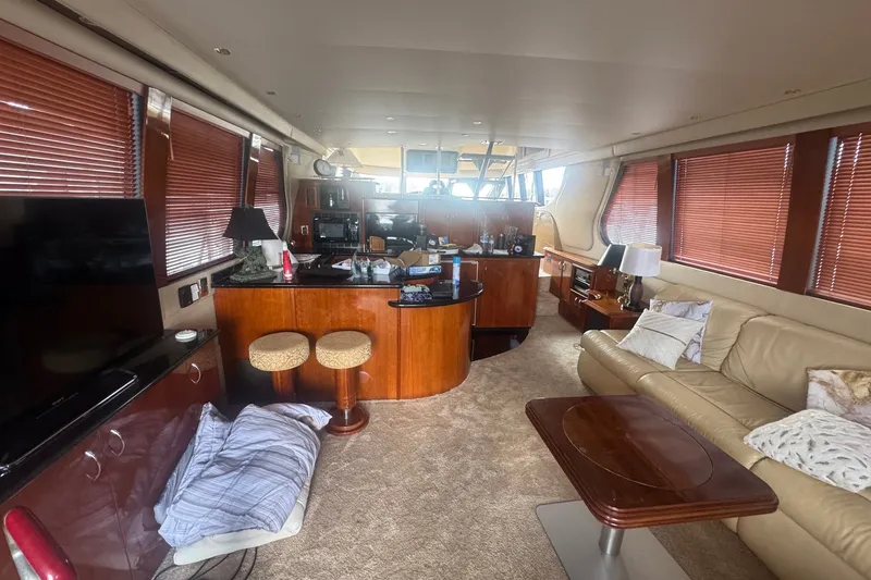 Slide: The Image of Luxurious interior of 2003 Carver 570 Voyager Pilothouse with elegant furnishings. - 18