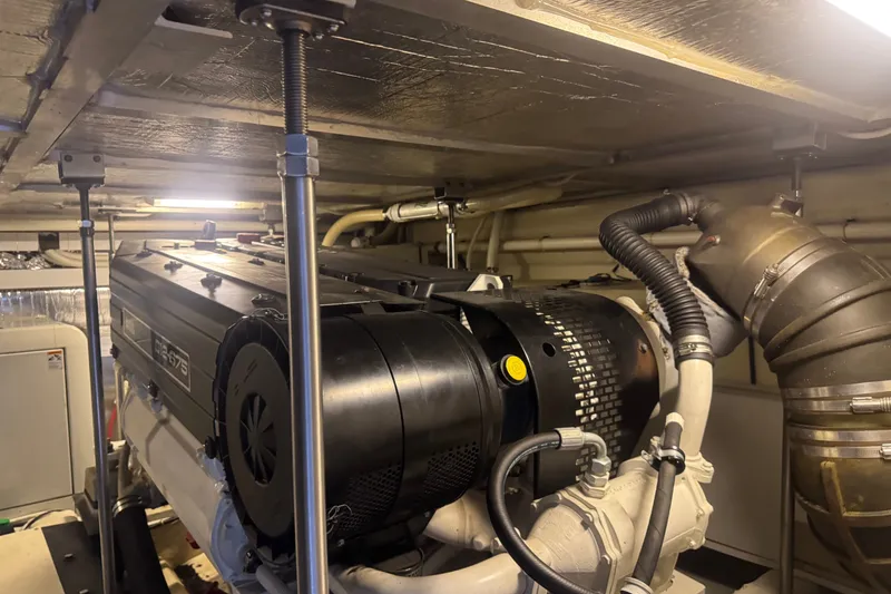 Slide: The Image of Engine room of 2003 Carver 570 Voyager Pilothouse with visible machinery and components. - 29